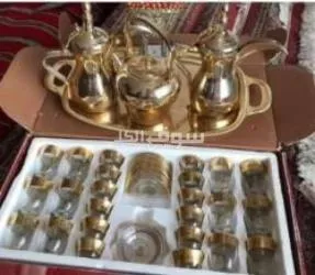 قهوجي الرمال وصبابين مع أغراضهم - 12